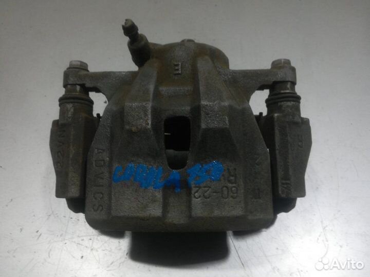 Суппорт передний правый Toyota Corolla 150