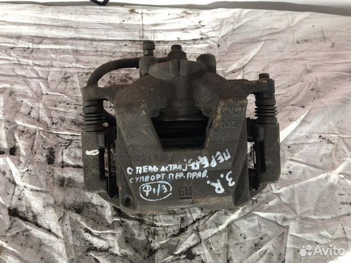 Суппорт тормозной передний правый Opel Astra J До