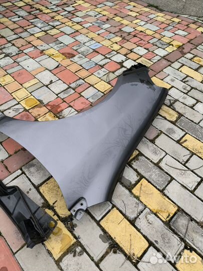 Toyota corolla 130 2003 USA крыло переднее левое