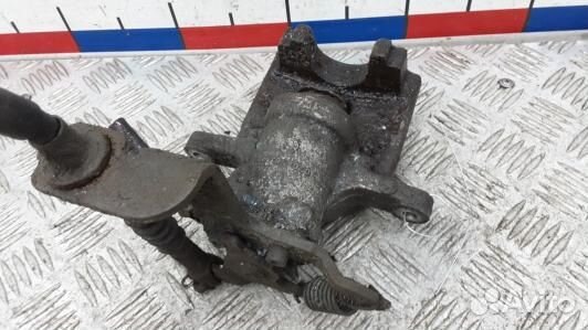 Суппорт тормозной задний левый toyota avensis T27