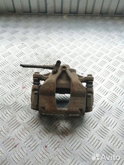 Суппорт тормозной передний правый Fiat Doblo 223