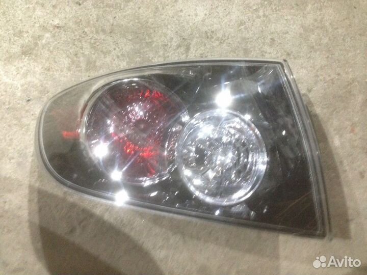 Фонарь задний левый в крыло Мазда 3 06-08 седан