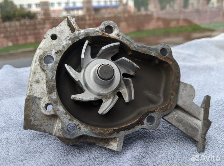 Насос водяной (помпа) Chevrolet Aveo