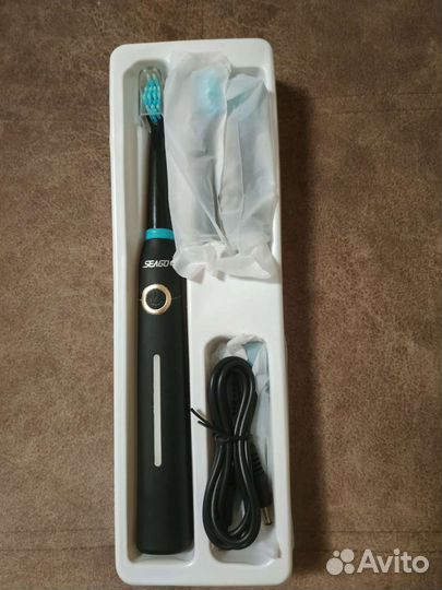 Электрическая зубная щётка новая