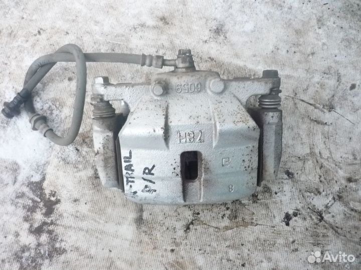 Суппорт тормозной передний Nissan X-Trail T31