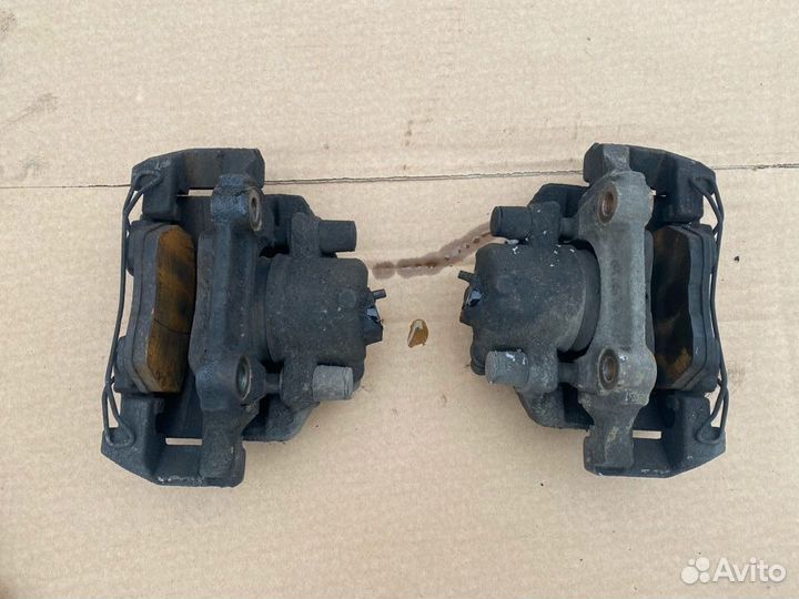 Суппорт тормозной передний Volkswagen Polo 5 sedan