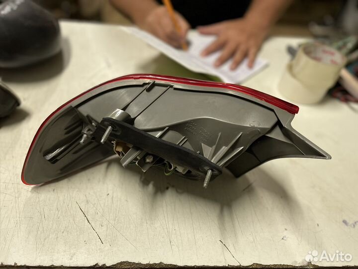 Фонарь задний левый Toyota Corolla E150