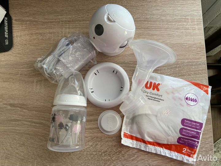 Молокоотсос электрический новый