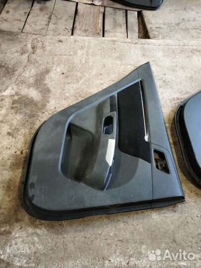 Обшивка задней левой двери Geely Emgrand EC 7
