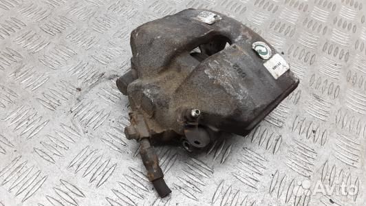 Суппорт тормозной передний левый volkswagen passat