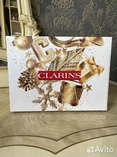 Наборы уходовой косметики Shiseido, Clarins