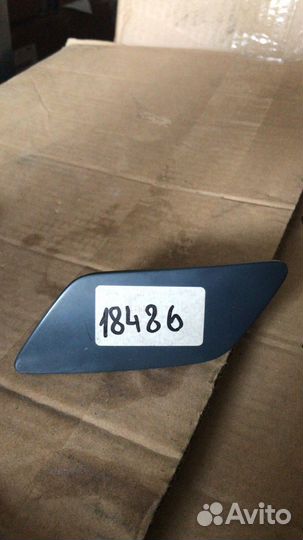 Крышка форсунки омывателя фары audi A3 левой