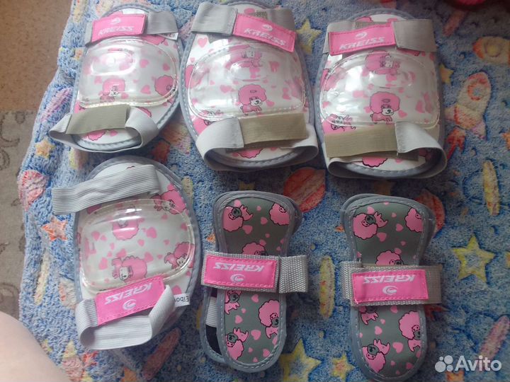 Роликовые коньки