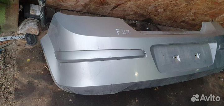 Бампер задний Opel Astra H 2004-2014