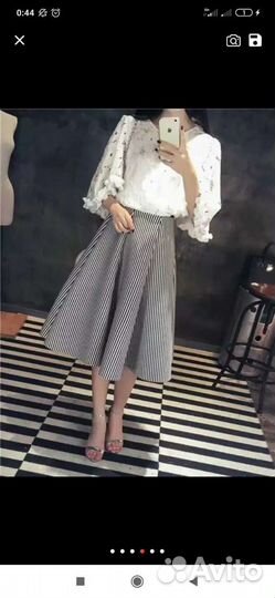 Юбки новые миди 42,44
