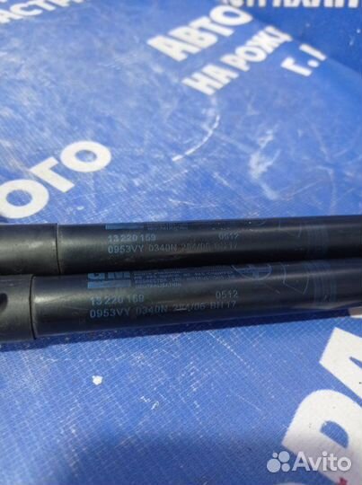 Амортизатор крышки багажника Opel Astra H