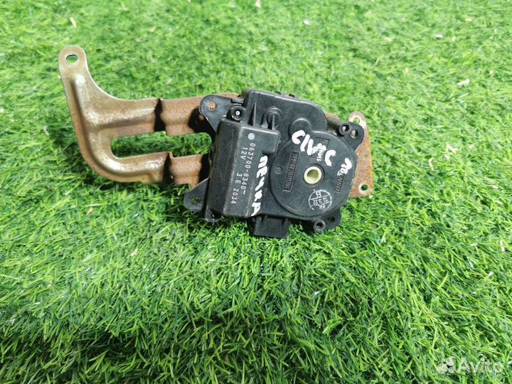 Моторчик заслонки отопителя Honda Civic VII