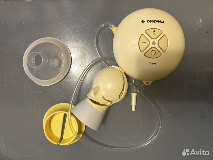 Молокоотсос medela swing