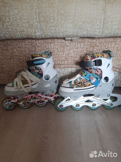 Коньки роликовые