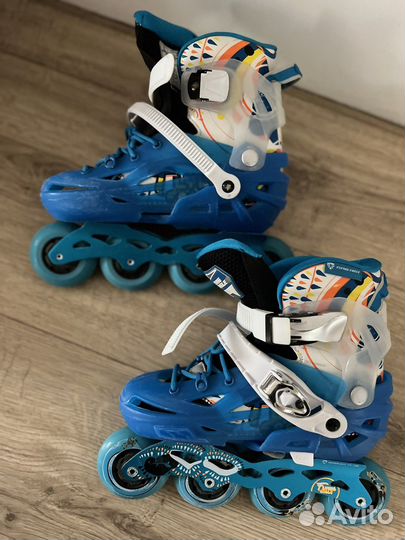 Роликовые коньки