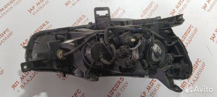 Фара галогеновая передняя левая Mitsubishi Lancer