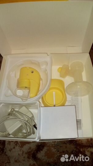 Молокоотсос Medela mini electric