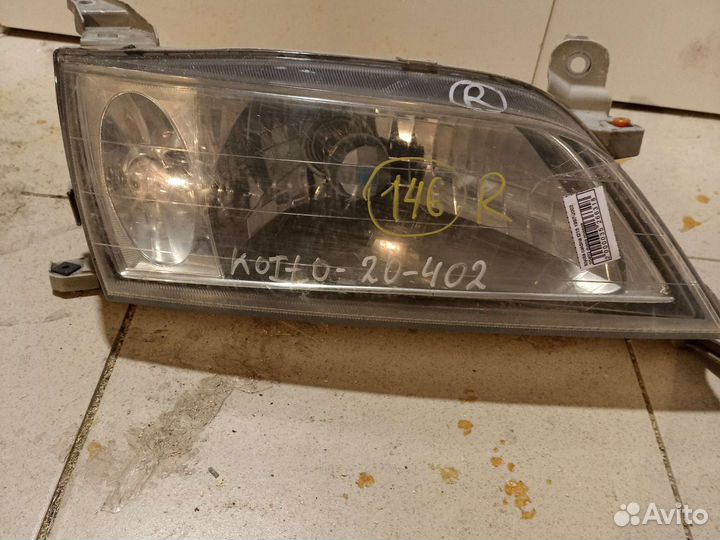 Фара Toyota Carina ST215