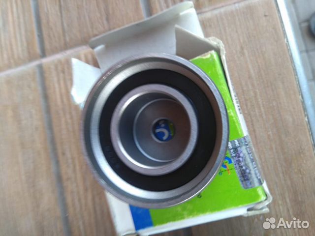 Ролик обводной ремня грм Hyndai Tucson Matrix Kia