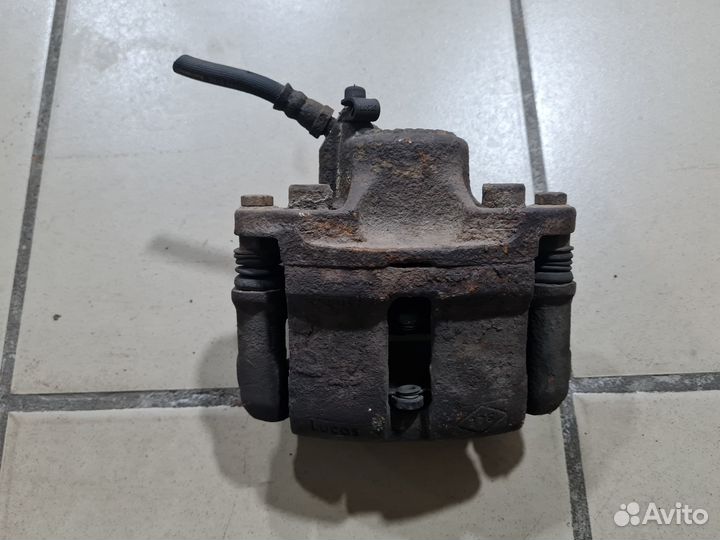 Суппорт тормозной Renault Megane I