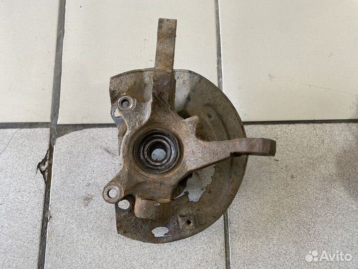 Поворотный кулак Mitsubishi Lancer VII