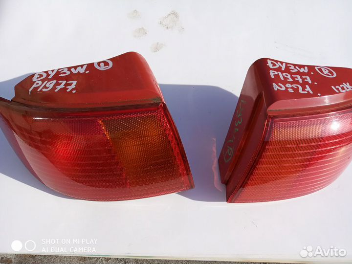 Стоп сигнал Мазда Демио. Фонарь Mazda Demio