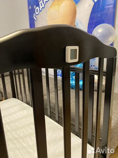 Детская кроватка с маятником и ящиком