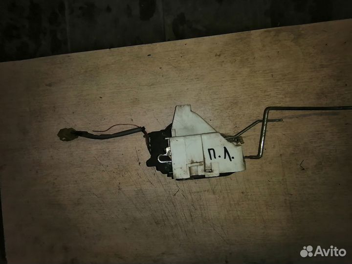 Замок двери передний левый киа Кларус