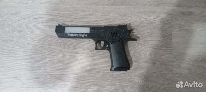 Игрушечный пистолет