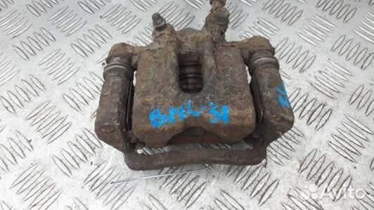 Суппорт тормозной задний левый toyota corolla E12