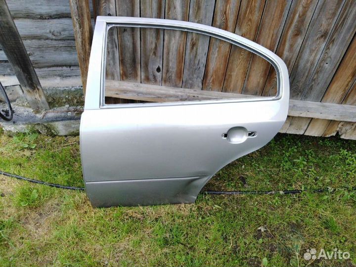 Задняя левая дверь Skoda octavia tour