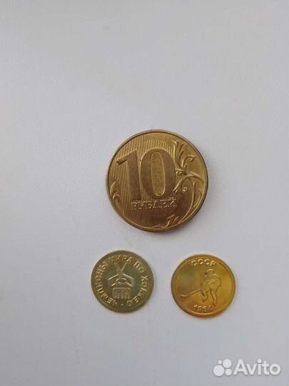 Серебряные монеты покрытые позолотой