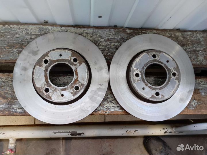 Тормозные диски передние на Lancer 9