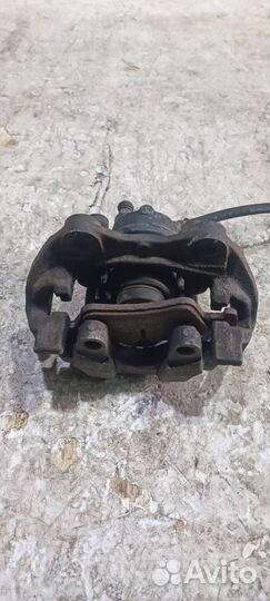 Суппорт задний левый