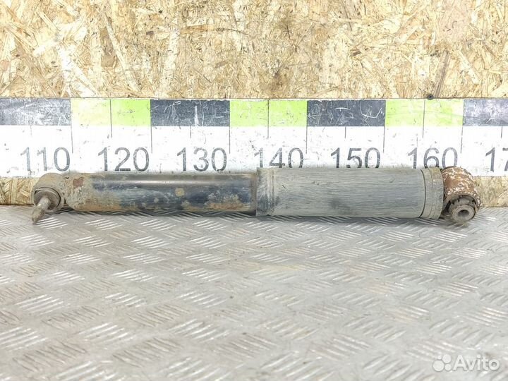 Амортизатор задний левый Renault Scenic 2003 2009