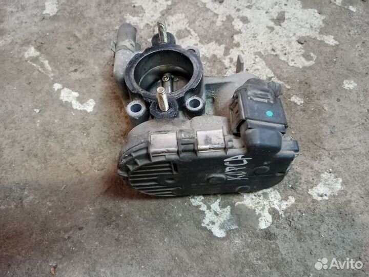 Дроссельная заслонка на Опель Корса С 2005 год