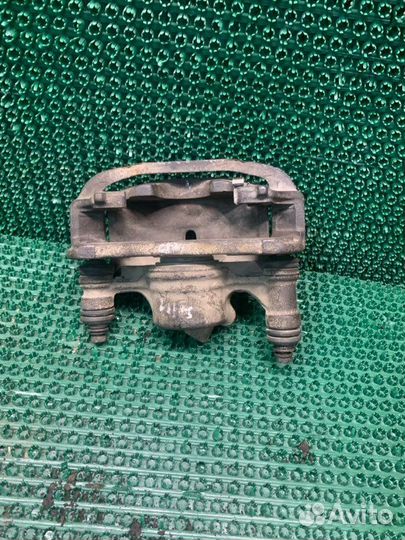 Суппорт тормозной передний левый Toyota Sprinter