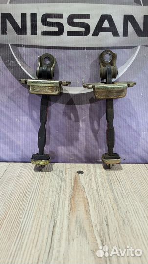 Ограничитель двери Nissan almera N16 Лев, Прав