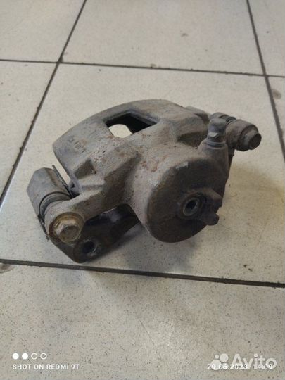 Суппорт тормозной передний правый Chevrolet
