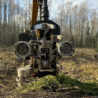 Гусеничный харвестер Caterpillar 320