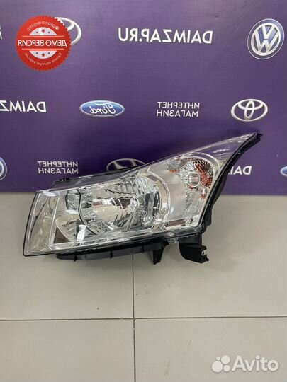 Фара Chevrolet Cruze хром мех. регулировка левая