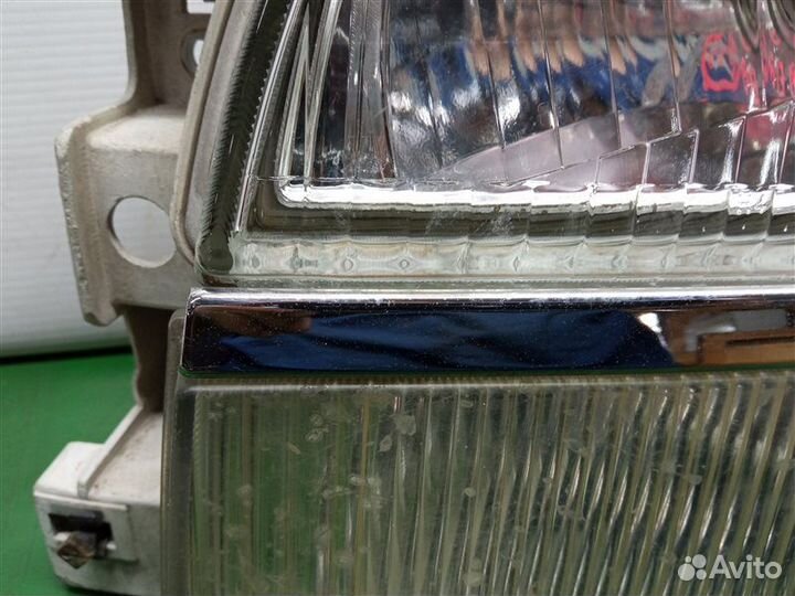 Фара передняя левая Nissan Elgrand ALE50