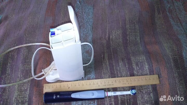 Электрическая зубная щетка Braun