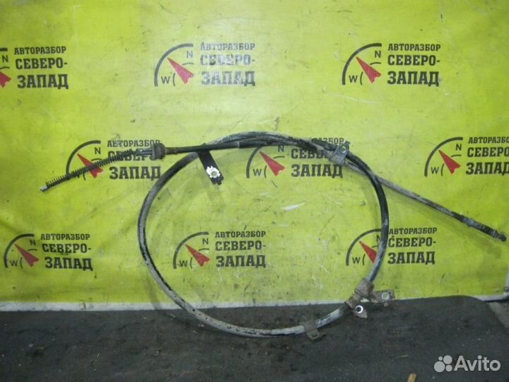 Трос ручника левый Mitsubishi L200 KB4T 4D56