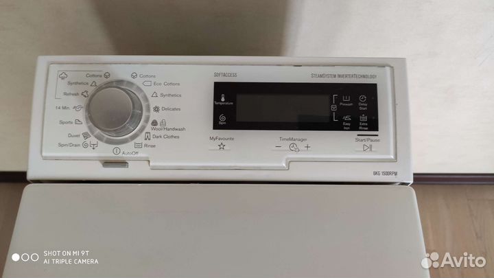 Стиральная машина с вертикальной загрузкой